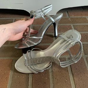 Tall kitten heels. Sparkles silver.